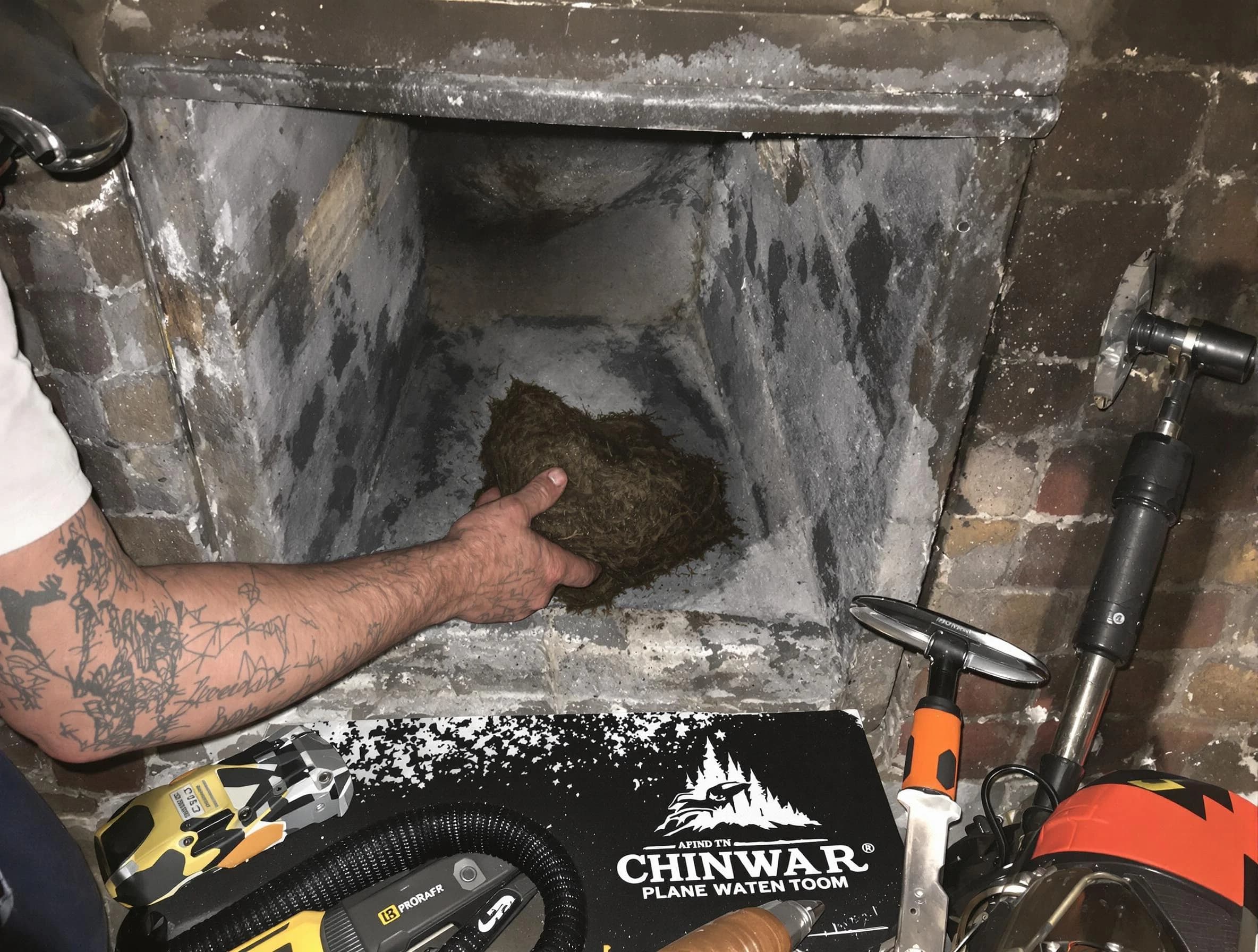 Maplewood Chimney Sweep safely removing debris and screening chimney in Maplewood, NJ